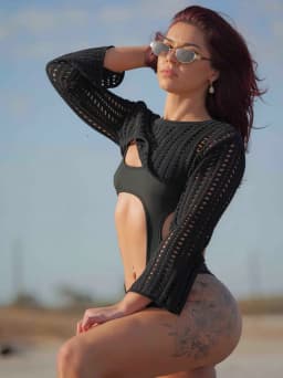 Scarlett wearing a black outfit offering nude massage, erotic massage and body rubs in Melbourne. Scarlett wearing a black outfit offering nude massage, erotic massage and body rubs in Melbourne.