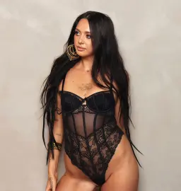 Erotic massage Melbourne, tattooed masseuse in black lace lingerie Erotic massage Melbourne, tattooed masseuse in black lace lingerie