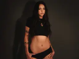 Happy ending massage Melbourne, slim tattooed masseuse in a black crop top Happy ending massage Melbourne, slim tattooed masseuse in a black crop top