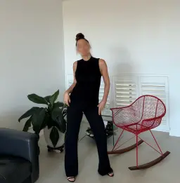 Happy ending massage Perth, brunette masseuse in a black top and wide leg trousers Happy ending massage Perth, brunette masseuse in a black top and wide leg trousers