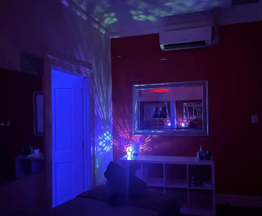 Massage parlour Adelaide private room with mirror and soft blue lighting Massage parlour Adelaide private room with mirror and soft blue lighting